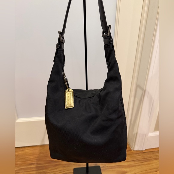 Coach Handbags - Vintage Coach Black Hobo Bag with Gold Accents